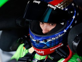 Danica Patrick, driver of the #10 GoDaddy.com Chevrolet, sits in her car in the garage during practice for the NASCAR Sprint Cup Series Toyota Owners 400 at Richmond International Raceway on April 24, 2015 in Richmond, Virginia. (Todd Warshaw/Getty Images/AFP)
