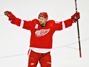Detroit Red Wings defenceman Niklas Kronwall celebrates his team's win over the Chicago Blackhawks during Game 4 of their NHL Western Conference semifinals playoff series at Joe Louis Arena on May 23, 2013. (REUTERS/Rebecca Cook)