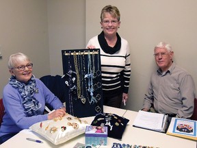 Donna Walton (left) and members of the Friends of the Tillsonburg Library Committee Elaine Balpataky and David Moule (president) display a small sample of gently-used jewellery that will be on sale at the library Saturday, May 2 (10-3) and Sunday, May 3 (1-3 p.m.). Eight tables of jewellery will be on sale in the Program Room. Proceeds go to youth summer programs at the library. (CHRIS ABBOTT/TILLSONBURG NEWS)