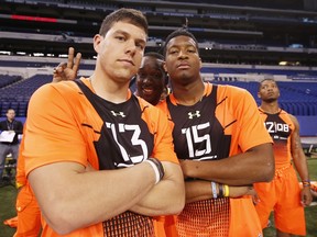 Quarterbacks Jameis Winston of Florida State and Bryce Petty of Baylor during the 2015 NFL Scouting Combine at Lucas Oil Stadium on February 21, 2015. (Joe Robbins/AFP)