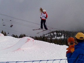 Onlookers watch Brittney Barber, 14, spin through the air during the Alberta Provincial Freestyle Championships held in Jasper, Alta. the week before the national championships. The Grade 9 St. Michael’s student came back to competitive skiing from a serious injury last year. Photo submitted.