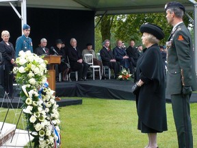 Queen Beatrix lays a wreath at the Groesbeek Canadian War Cemetery in the Netherlands Monday May 3, 2010