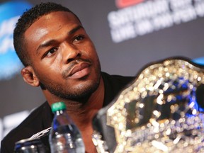 UFC light heavyweight champion Jon Jones pauses during a press event in Toronto July 9,2013. (Postmedia Network file photo)