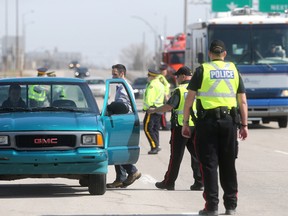 Police were stopping motorists on Main Street closet to the north perimeter, in Winnipeg today.  They were looking for distracted drivers.  Wednesday, April 29, 2015.