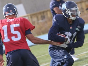 Anthony Woodson, taking a handoff in practice for the Argos last season, could be replacing another former Toronto teammate in slotback Spencer Watt for the Ticats. (DAVE THOMAS, Toronto Sun)