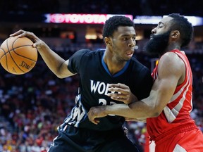 Andrew Wiggins (left) of the Minnesota Timberwolves looks to drive against James Harden of the Houston Rockets during their game at the Toyota Center on March 27, 2015 in Houston, Texas. (Scott Halleran/Getty Images/AFP)