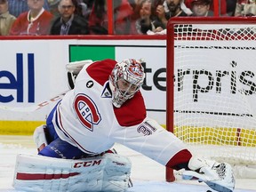 Montreal Canadiens goaltender Carey Price makes a glove save during NHL playoff action against the Ottawa Senators at the Canadian Tire Centre in Ottawa on April 26, 2015. (Errol McGihon/Ottawa Sun/Postmedia Network)