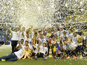 Club America celebrates their victory over the Montreal Impact in the CONCACAF Champions League final at Olympic Stadium. (Eric Bolte-USA TODAY Sports)