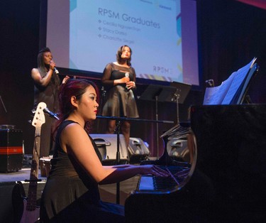 Cecilia Nguyentran (on piano), Stacy Ahenkora-Darko (left) and Charlotte Siegel perform at CRESCENDO 2015 in support of Regent Park School of Music held at Ada Slaight Hall in Daniels Spectrum in the Regent Park neighbourhood in Toronto, Ont. on Wednesday April 29, 2015.  The evening include musical performances by student, recent graduates and special guests. Ernest Doroszuk/Toronto Sun
