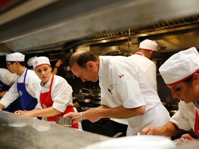 Chef Michael Bonacini hard at work at Canoe Restaurant. (Handout photo)