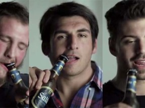 Argentinian rugby players open beer bottles with specialized dental implants. (YouTube)