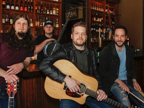 Matt Kirby, left, Nick 'Pickins' Patterson, Ryan Gollogly and Aidan Campbell, at Sir John's Public House, are members of the local band Goldwing, which will play at the HomeGrown Live music festival in Kingston.
(Julia McKay/The Whig-Standard)
