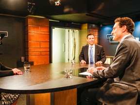 Ontario PC leadership candidates, Christine Elliott and Patrick Brown, square off on a television debate, with Steve Paikin, at TVO, in Toronto on April 30, 2015. (Dave Thomas/Toronto Sun)