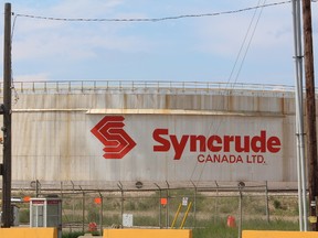 A storage tank for Syncrude Canada north of Fort McMurray Alta., in this June 2014 file photo. (Vince McDermott/Postmedia Newtwork file photo)