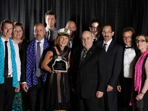 The Aquarian Renovations contingent celebrates at the April 25 CHBA-ER Awards of Excellence in Housing gala. Pictured is (L-R) Andrew Cox, Jessica Brownell, Jamie Emin (Glenora Lumber), Colin Whitaker, Marie Soprovich, Chris Kaehler, Wayne Richey, Jason Soprovich, Jean Ethier, Ron Bergem, and Kerry Connelly (Glenora Lumber).