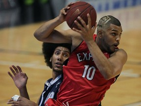 Windsor Express Kevin Loiselle hauls down a high pass against Halifax Rainmen Kevin Young at the end of the first quarter in NBL Canada Championship Game 6 at WFCU Centre, Tuesday April 28, 2015. (NICK BRANCACCIO/The Windsor Star)