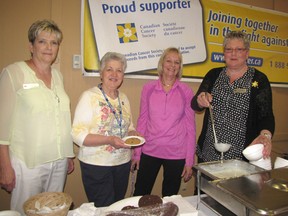 Julie Hill, Chatham Retirement Resort activity director; volunteer Priscilla Yellowage, volunteer Deb Stephenson, and Ann Pollock, environmental manager, were on hand to help out with the 25th Cooking for Cancer Cures Luncheon on April 30. (Blair Andrews/Chatham This Week)