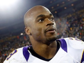 With a potential trade seemingly off the table and his reinstatement finalized, Vikings running back Adrian Peterson appears to want to stay in Minnesota for the rest of his career - if the Vikings will commit to him. REUTERS/Tom Lynn/Files