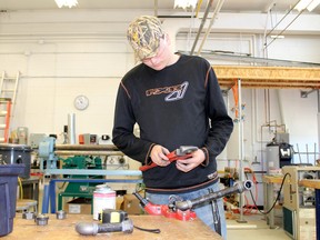 Josh Roy works on a piping project in the shop at College Avenue Secondary School. Roy is one of the students who will represent Oxford County at a provincial skills competition in Waterloo this week. (MEGAN STACEY, Sentinel-Review)