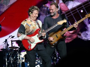 Andy Summers and Sting on stage in Sacramento during a performance from The Police Reunion Tour 2007/08. Photo credit: Norman Golightly