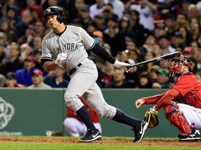 New York Yankees hitter Alex Rodriguez drills a home run to tie Willie Mays for fourth place in career home runs during MLB play against the Boston Red Sox at Fenway Park. (Bob DeChiara/USA TODAY Sports)