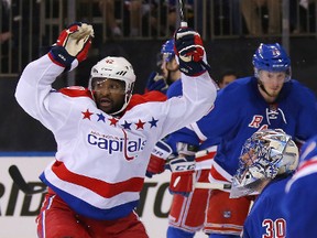 Caps Joel Ward scores the OT winner in Game 1. (AFP)