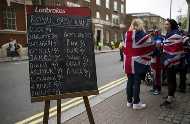 A board stating the betting odds for baby names stands outside the entrance to the Lindo wing of St Mary's Hospital in central London May 2, 2015. REUTERS/Neil Hall