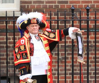 The town crier announces the birth of the new royal baby outside St. Mary's Hospital in London, May 2, 2015. Catherine, Duchess of Cambridge and Prince William are new parents after she gave birth to a baby girl. (Tony Appleton/WENN.com)