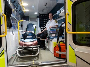 Middlesex-London EMS superintendent of education Jay Loosley sits in the back of an ambulance in their Waterloo Street headquarters in London on Friday. Loosley says the emergency service is seeing an increase in the number of calls for patients who have overdosed.Craig Glover/The London Free Press/Postmedia Network