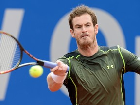 Britain's Andy Murray returns the ball during his semi-final match against Spain's Roberto Bautista Agut at the ATP tennis Open in Munich, southern Germany, on May 2, 2015. Murray won the match 6-4, 6-4. AFP PHOTO/CHRISTOF STACHE