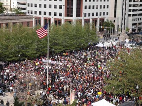 A large crowd gathers for a rally at city hall in Baltimore, May 2, 2015. Hundreds of people took to the streets of Baltimore on Saturday as anger over the death of a young black man turned to hopes for change following swift criminal charges against six police officers. REUTERS/Lucas Jackson