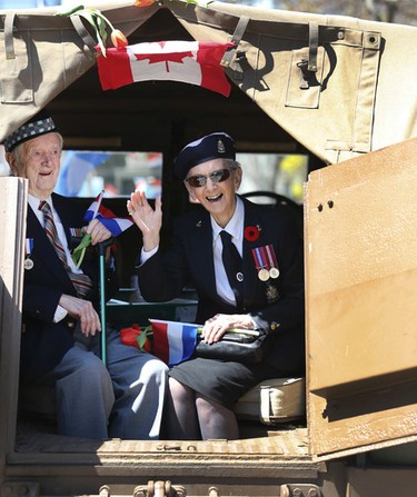 Carl and Doris Spence take part in the Thank You Canada-Dutch Liberation Festival parade on Saturday May 2, 2015. Veronica Henri/Toronto Sun/Postmedia Network