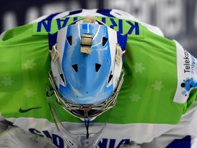 Slovenia's goalkeeper Ziga Jeglic concentrates during the group B preliminary round ice hockey match Belarus vs Slovenia of the IIHF International Ice Hockey World Championship on May 2, 2015 at the CEZ Arena in Ostrava. AFP PHOTO / JOE KLAMAR