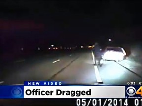 CBS Denver obtained a dramatic new video of a police chase in Colorado shows an officer clinging to a vehicle during a high-speed pursuit that began after a routine traffic stop. (denver.cbslocal.com screengrab)