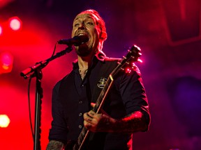 Michael Poulsen of Volbeat at Rexall Place Saturday night. (CODIE MCLACHLAN/Edmonton Sun)