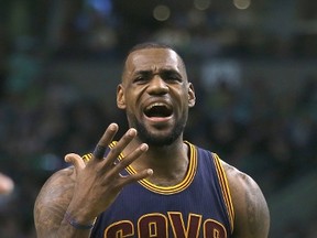 LeBron James #23 of the Cleveland Cavaliers reacts in the second half against the Boston Celtics in Game Four during the first round of the 2015 NBA Playoffs on April 26, 2015 at TD Garden in Boston, Massachusetts.  Jim Rogash/Getty Images/AFP