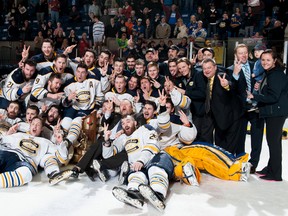 The Carleton Place Canadians celebrate their Fred Page Cup championship, Sunday in Cornwall. The Canadians are the first team to win back-to-back Fred Page Cup titles.
Robert Lefebvre/Special to the Cornwall Standard-Freeholder/Postmedia Network