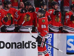 Blackhawks right wing Patrick Kane (88) is congratulated for scoring during the second period in game two of the second round of the 2015 Stanley Cup Playoffs against the Wild in Chicago, Sunday, May 3, 2015. Dennis Wierzbicki-USA TODAY Sports