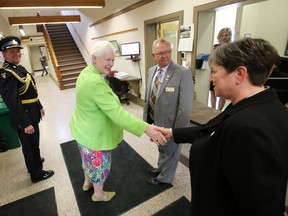 Lt. Gov. of Ontario Elizabeth Dowdeswell meets with Karen Kirby (right), executive assistant to Mayor Mayor of Prince Edward County Robert Quaiff (second from right) as she arrived for an informal visit of Shire Hall in Picton, Ont. Friday, May 1, 2015. -  Jerome Lessard/Belleville Intelligencer/Postmedia Network