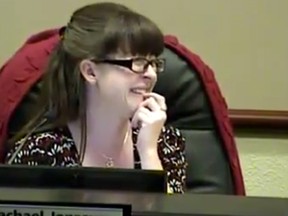 Councillor Rachael Jonrowe couldn't keep it together after a fellow councillor forgot to turn off his microphone when going to the bathroom.
(Screenshot from YouTube)