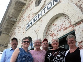 ERNST KUGLIN/THE INTELLIGENCER
Preben and Erling Hansen and sisters Ethel Hansen Davey, Ingrid Brooks, Lene Sharpe and Bente Barton stand together at the Brighton Junction to celebrate the 60th anniversary of the family's arrival in Canada from Denmark. They stepped off the train with parents Jens Peter and Osa on May 1, 1955 after a transatlantic journey aboard a Dutch freighter that originated in Hamburg, Germany.