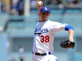 Los Angeles Dodgers starting pitcher Brandon McCarthy (38) pitches the second inning against the Colorado Rockies at Dodger Stadium. (Gary A. Vasquez-USA TODAY Sports)