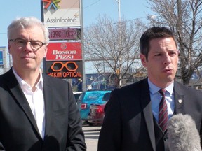 Premier Greg Selinger announced $65 million in road repairs for the City of Winnipeg Monday, May 4, 2015, flanked by Mayor Brian Bowman.