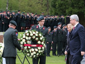 Stephen Harper and his wife Laureen attended the 70th anniversary remembrance ceremony at the Canadian War Cemetery in Holten, Netherlands, May, 4, 2015. (ERICA BAJER/Postmedia Network)