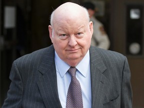 Suspendit Senator, Mike Duffy exits the Ottawa courthouse after his trial on Wednesday.   Joel Watson/Ottawa Sun/PostMedia Network