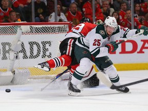 Minnesota Wild defenceman Jonas Brodin and Blackhawks’ Jonathan Toews collide during Game 2 of their second-round series on Sunday at the United Center in Chicago. Despite being down 2-0 in the series, the Wild believes it can win the series. (USA TODAY SPORTS/PHOTO)
