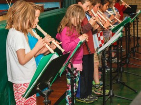 The students in the Grade 2/3 class at Rideau Public School, in Kingston, Ont., perform Old MacDonald on recorders as part of the National Music Monday celebrations on Monday May 4, 2015. Since it's launch 10 years ago, Music Monday's goal of raising awareness and celebrating music in schools will see 5.6 million Canadians participating across the country, this year alone. Julia McKay/The Kingston Whig-Standard/Postmedia Network