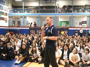 Olympic gold medalist curlera Brad Jacobs addresses students and staff at the Marymount Academy  in Sudbury, Ont. on Monday May 4, 2015.