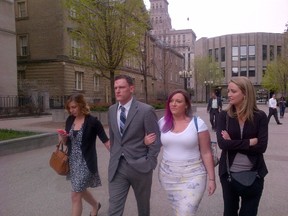 Luke Heath and sisters outside court after he pleaded guilty to manslaughter Monday, May 4, 2015 in the death of Brian Takahashi in January 2011. (Sam Pazzano/Toronto Sun)