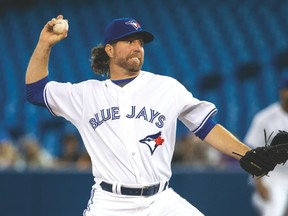 Blue Jays starter R.A. Dickey picked up his first win of the season on Monday night, beating New York. (CRAIG ROBERTSON/Toronto Sun)